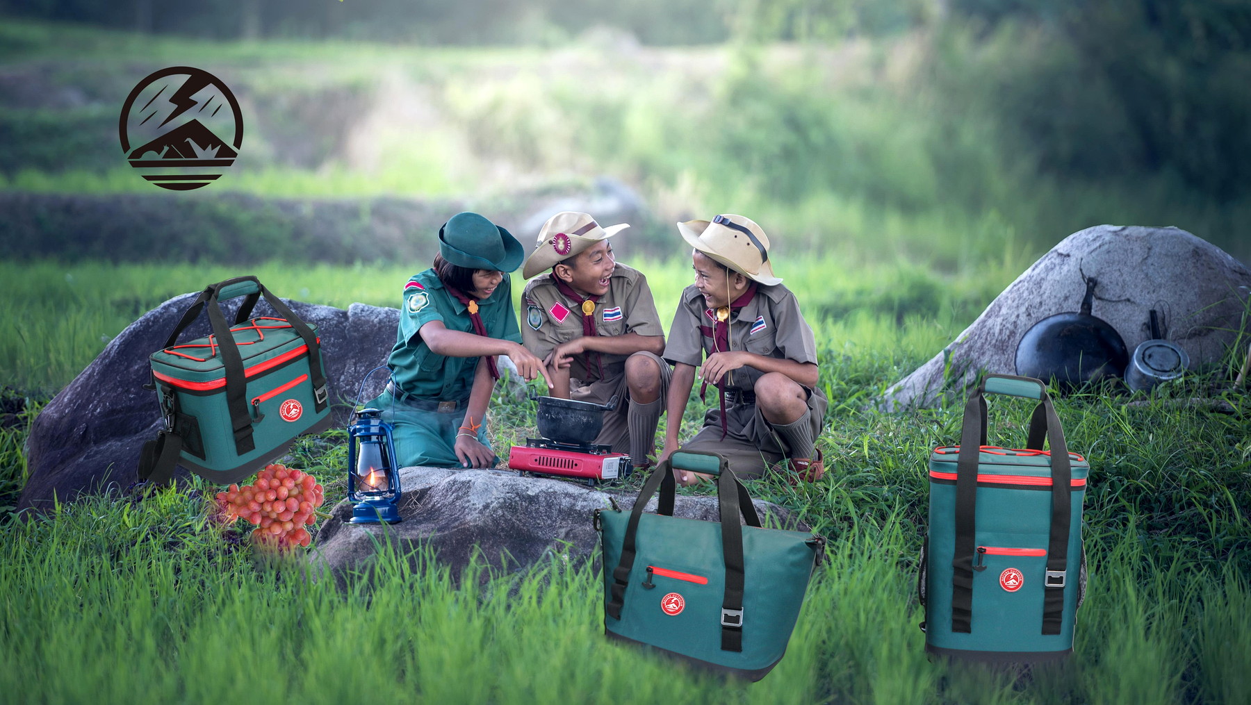 Grass camping picnic scene with NATURE OUTDOOR cooler bags